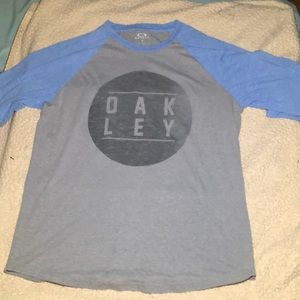 A large Oakley half sleeve shirt